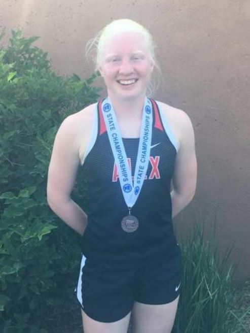 Mya Lynn Lesnar wearing a bronze medal after competing in the State Championship.