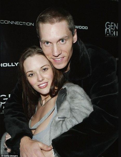 Anna Benson con su ex marido, Kris Benson.