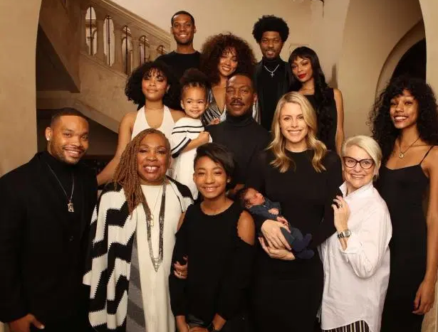 Eddie Murphy poses with all TEN of his kids 