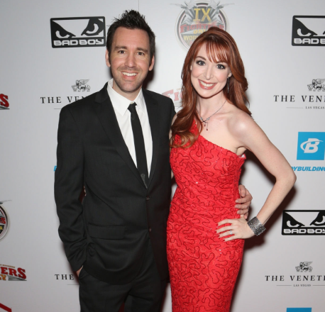 Lisa Foiles with her husband in the red carpet