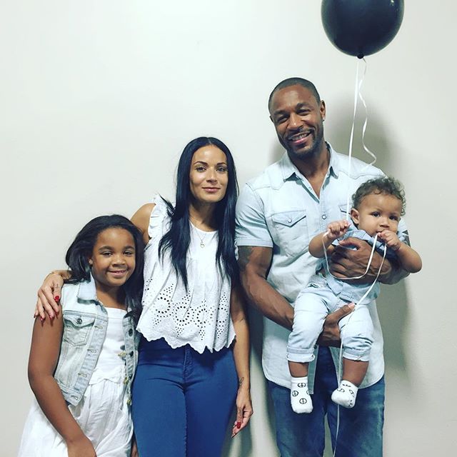 Zena Foster and her husband with their children