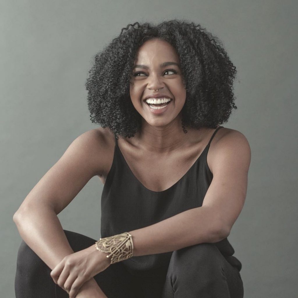 The Happy Face: Jerrika Hinton.