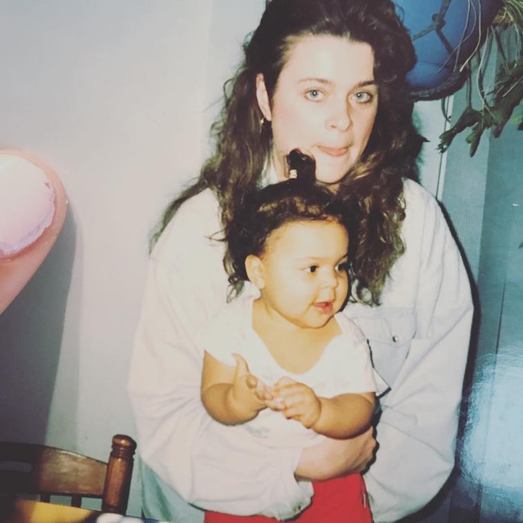 Childhood photo of Kayla McBride with her mother.