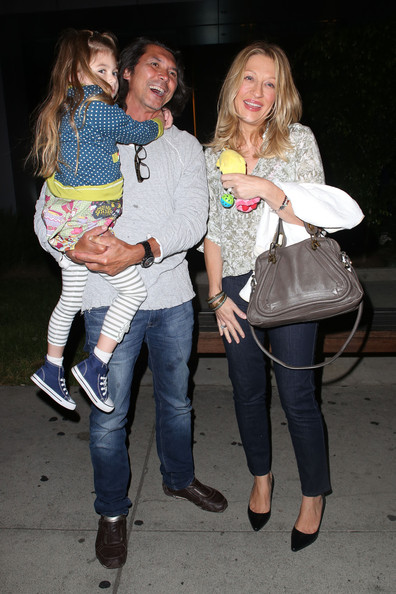 Lou with his current wife, Yvonne and with their daughter