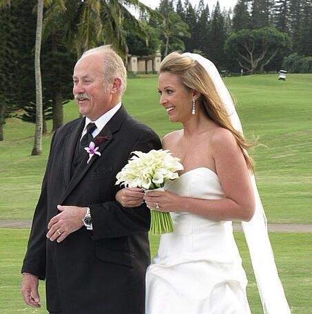 Ryan Briscoe with her father on her wedding day