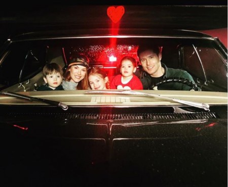 Ackles family photo inside their car