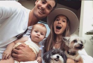 Madison Mckinley along with her husband, daughter, and two dogs