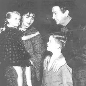 Robert alongside his wife and children.