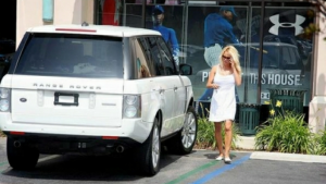 Pamela going shopping in her Range Rover.