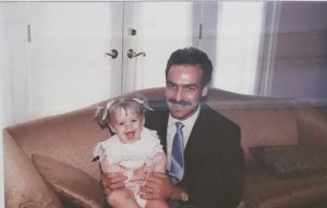 Childhood image of Allie Wood along with her father