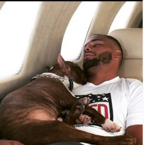 Dak Prescott traveling on the Nicholas Air with his dog