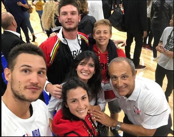 Ettore Messina with his team