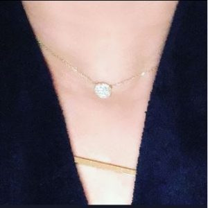 Jennifer Brennan posts about her new necklace from Golden Thread Inc.