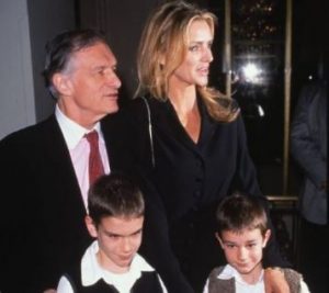 Kimberly Conrad with her former and late-husband, Hugh Hefner and their two sons, Marston and Cooper