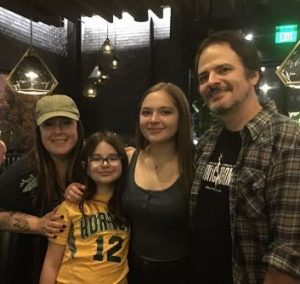 Rob Bonfiglio with her spouse and two daughters