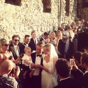 Alan walking down the aisle with wife Gabrielle and daughter.