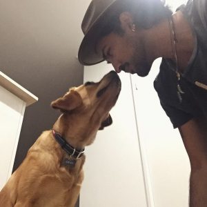 Mahesh with his dog Eskimo during Christmas.