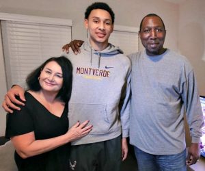 Dave Simmons (R) with his son Ben Simmons (m) and wife Julie (L).