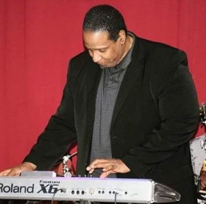 Maurice Starr while playing piano