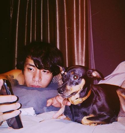 Yu Ba-rom with his dog, Lori