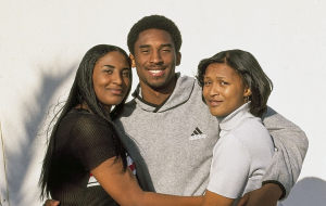 Kobe Bryant with his siters; Shaira and Shaya Bryant