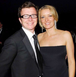 Rick Astley posing for a picture with his wife Lene