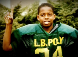 Brian Banks during his High-School wearing a football jersey. 