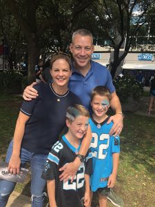 Jerry with his wife and two son hanging out.