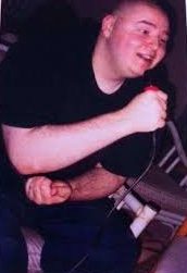 Kevin in his early years before getting tattoos all over his body
