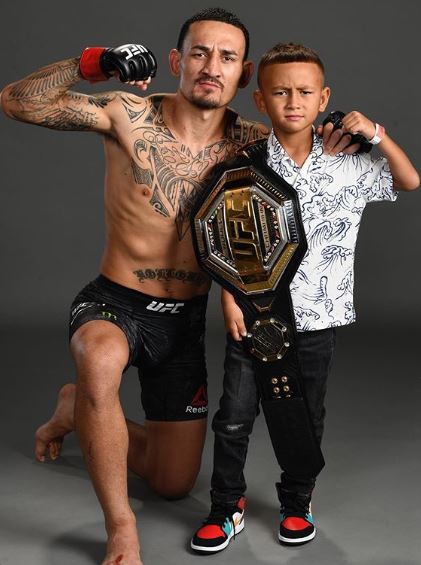 Max Holloway with his son Rush