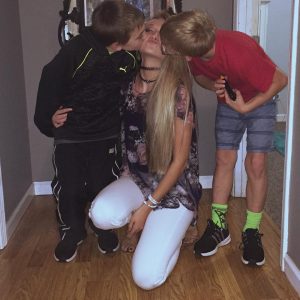 Tasia took a picture with her younger brothers