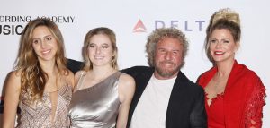 Sammy with his second wife and two daughter at an event.
