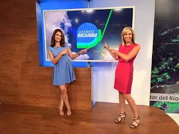 Jacqui Jeras presenting the weather news with her co-anchor. 
