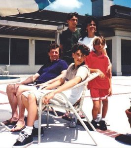 Dave Franco (wearing a red t-shirt) with his father, mother and two older brothers.