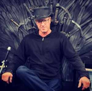 Jake took a picture for his social media account while sitting in Iron Throne