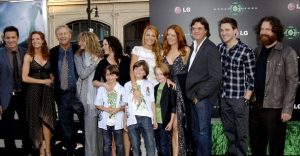 Jason Lively with his family members in an event ceremony.
