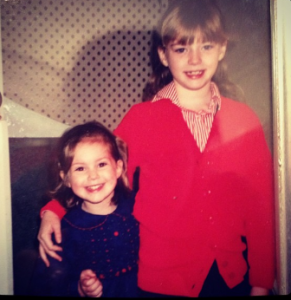 Vanessa took a picture with her sibling during her early years