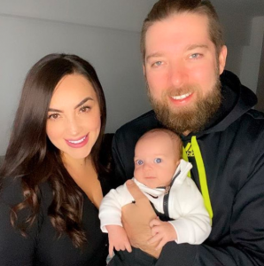 Daly with her husband and a baby son, Lucca Rojas.