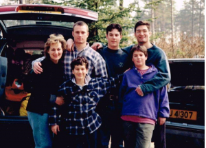 Charlie Cavill with his mother and three older brothers in early teenage.