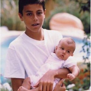 Ana Boyer at a small age with her half-brother Enrique Iglesias.