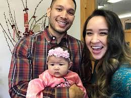 Cathy Nguyen with her husband and daughter