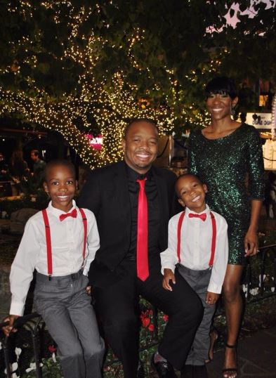 Kevin Fredericks with his wife and children