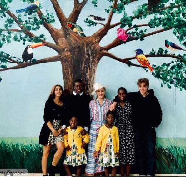 Mercy James with her siblings