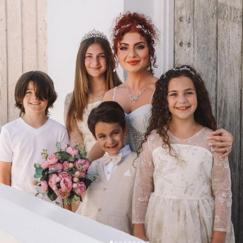 Sophie Fatu with her family during her mother's wedding