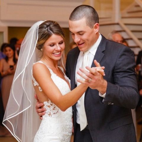 Alexis T. Realmuto and husband, during their wedding