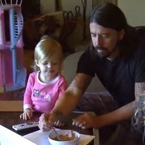 Baby Harper Willow Grohl with her father
