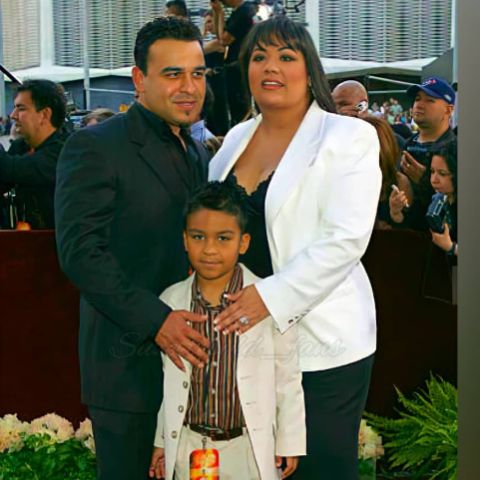 Young Jovan Arriaga with his mom and dad
