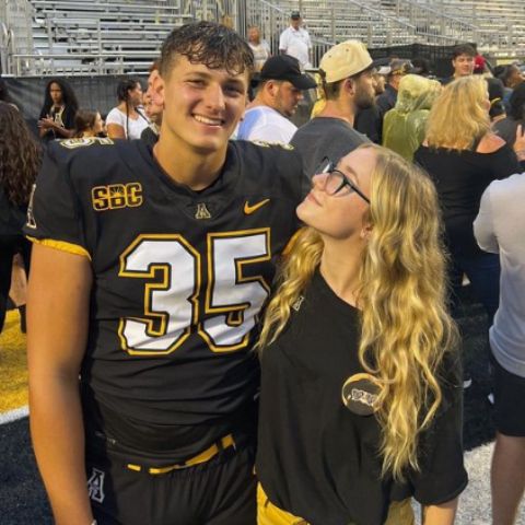 Tess Reinhart with her boyfriend, Dylan being proud of him with his game career