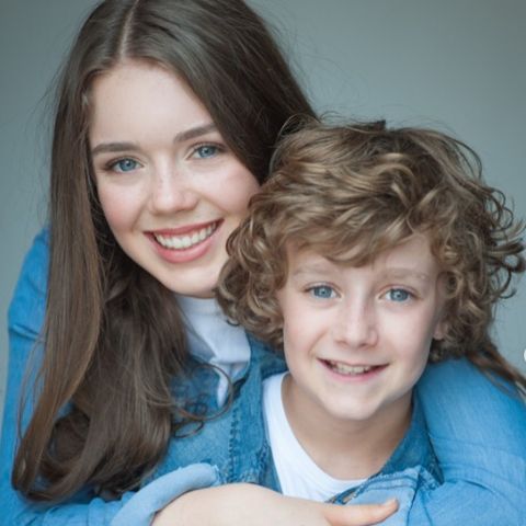 Luke Roessler with his elder sister, Melissa